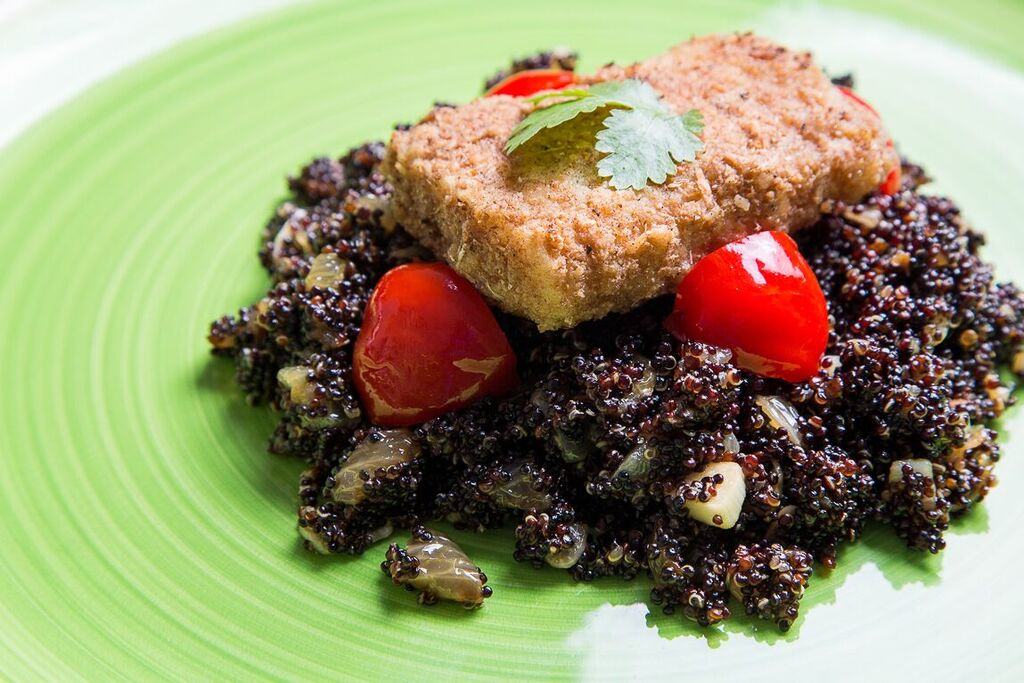 Pan-Fried Cod dusted in spelt flour and coconut and served on quinoa with garlic and onions.